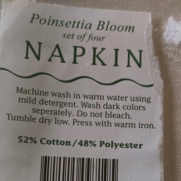 Dinner napkins in an Ivory color Poinsetta Bloom design.4 per package.CottonPoly - Picture 1 of 4
